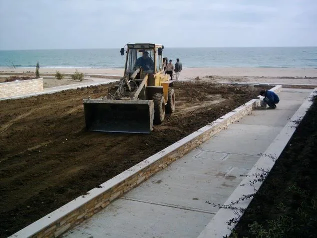 site preparation excavator beach